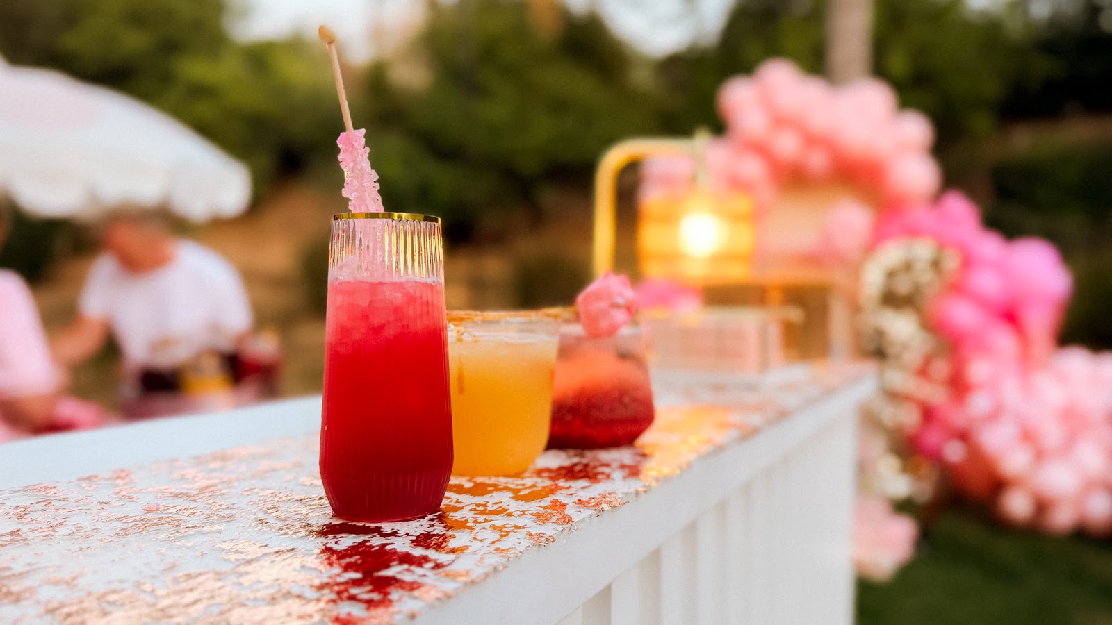 Elevated non-alcoholic drinks displayed on a styled beverage bar