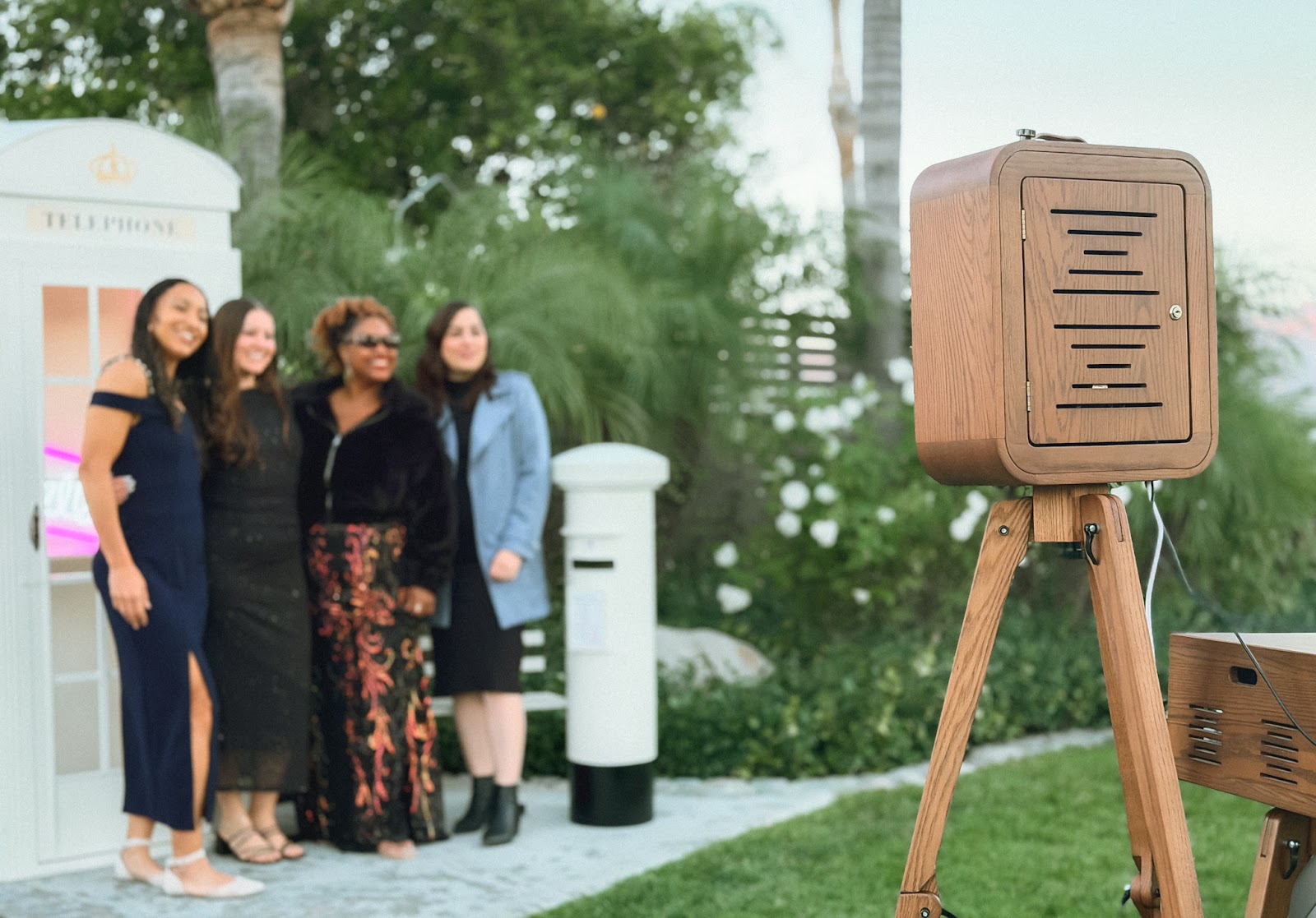 Retro-inspired mocktail bar photo booth setup at a celebration
